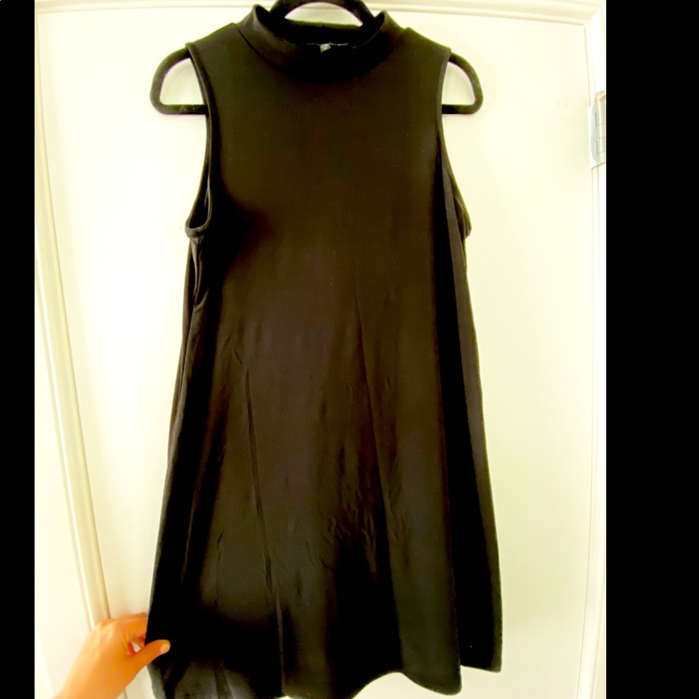 Black sleeveless high neck dress